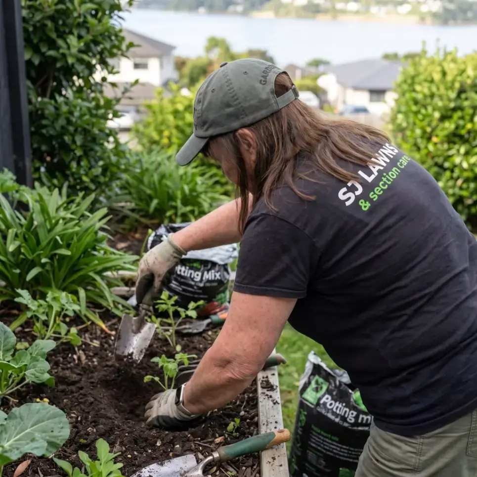 Jenny gardening for SJ Lawns